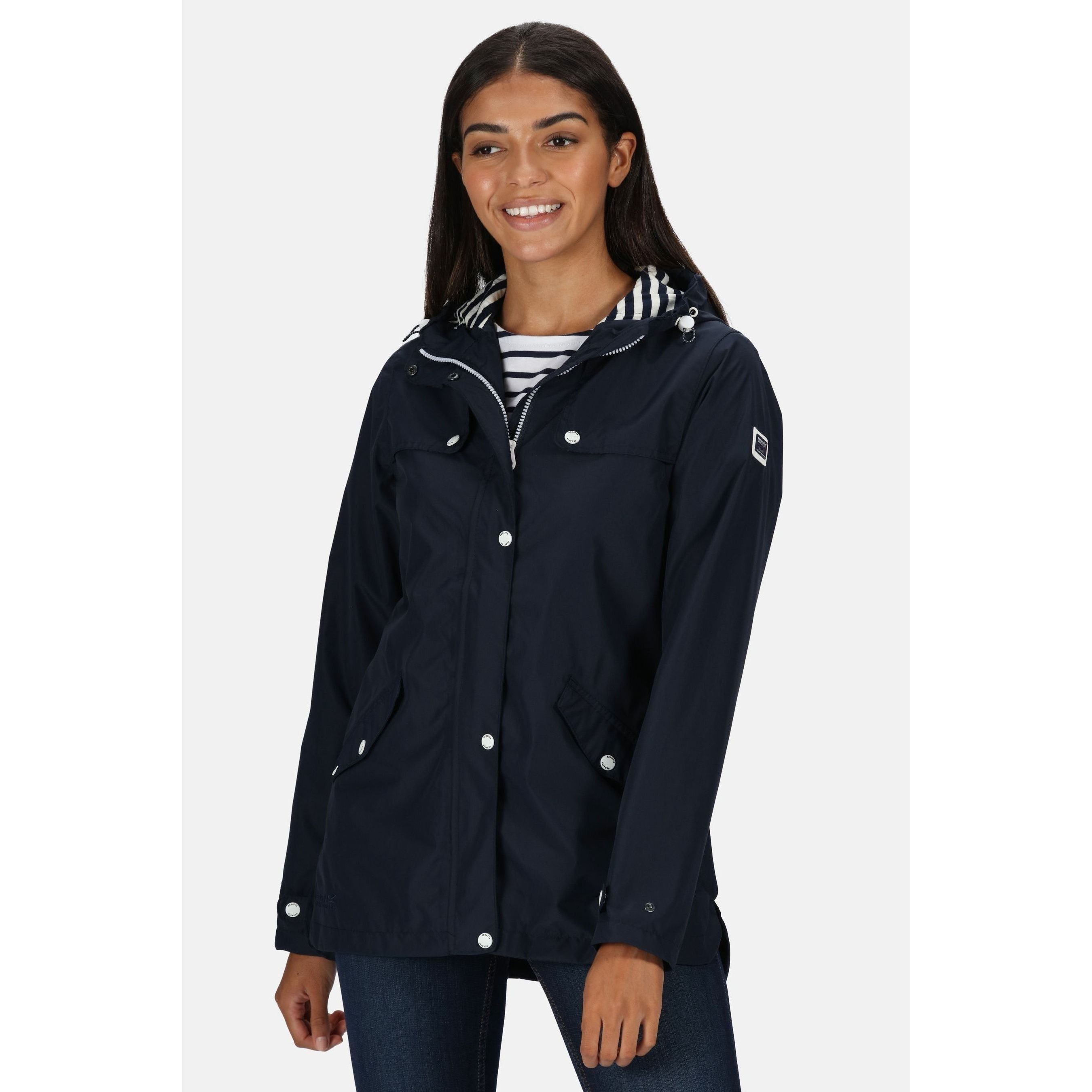Material: 100% polyester. Breathability rating 5,000g/m2/24hrs. Durable water repellent finish. Taped seams. Part cotton chambray, part polyester taffeta lining. Internal security pocket. Grown on hood with adjusters. Adjustable cuffs. 2 lower pockets with flaps and branded snap fastening.