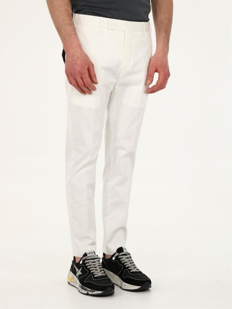 Slim fit white cotton trousers with side and back pockets. Zip closure and hidden hook.The model is 183 cm tall and wears size M / 48IT