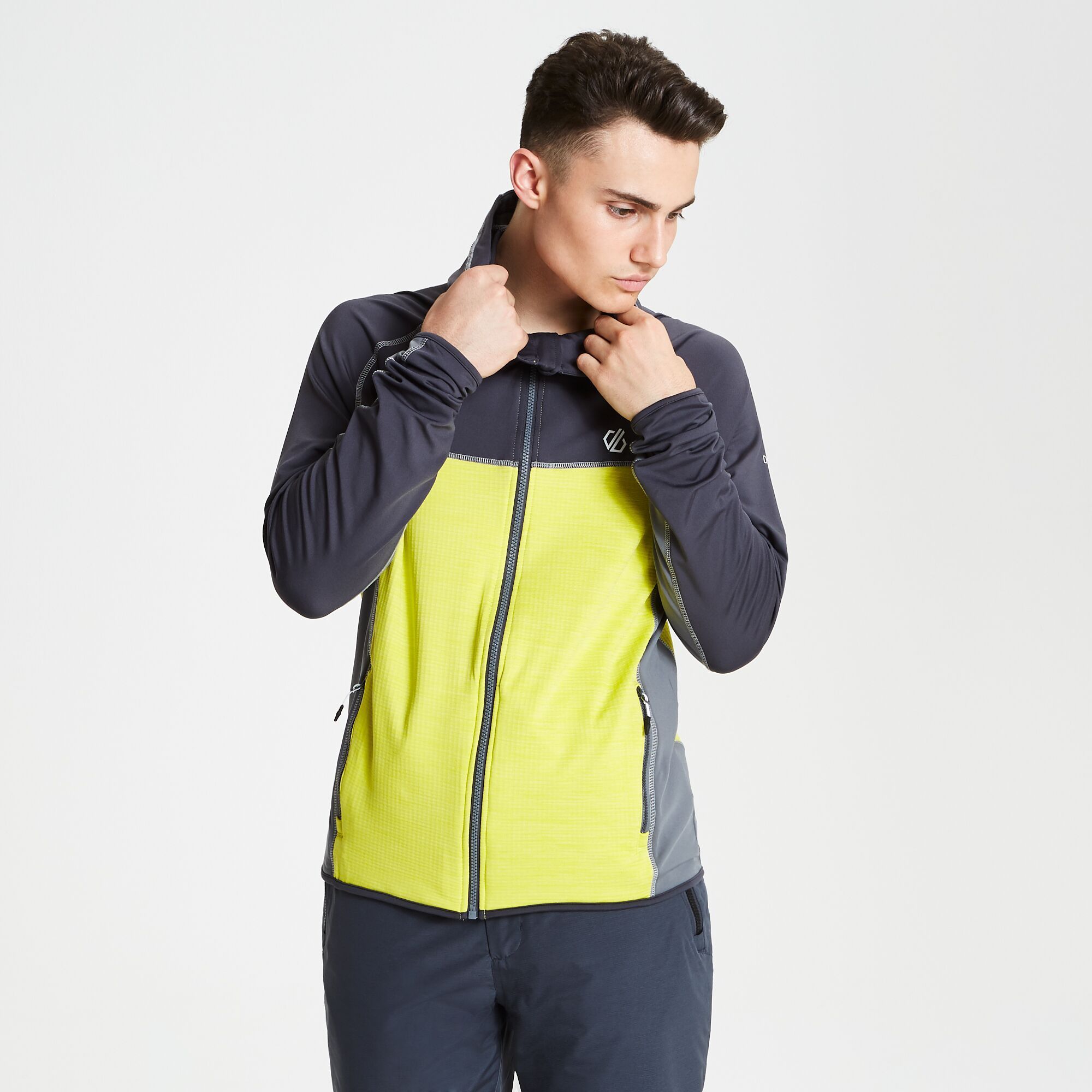 88% polyester, 12% elastane. Lightweight Ilus Core warm backed knitted stretch fabric with marl mix. Quick drying. Grown on hood. Full length zip. Inner zip & chin guard. 2 x lower zip pockets. Stretch binding to cuffs and hem.
