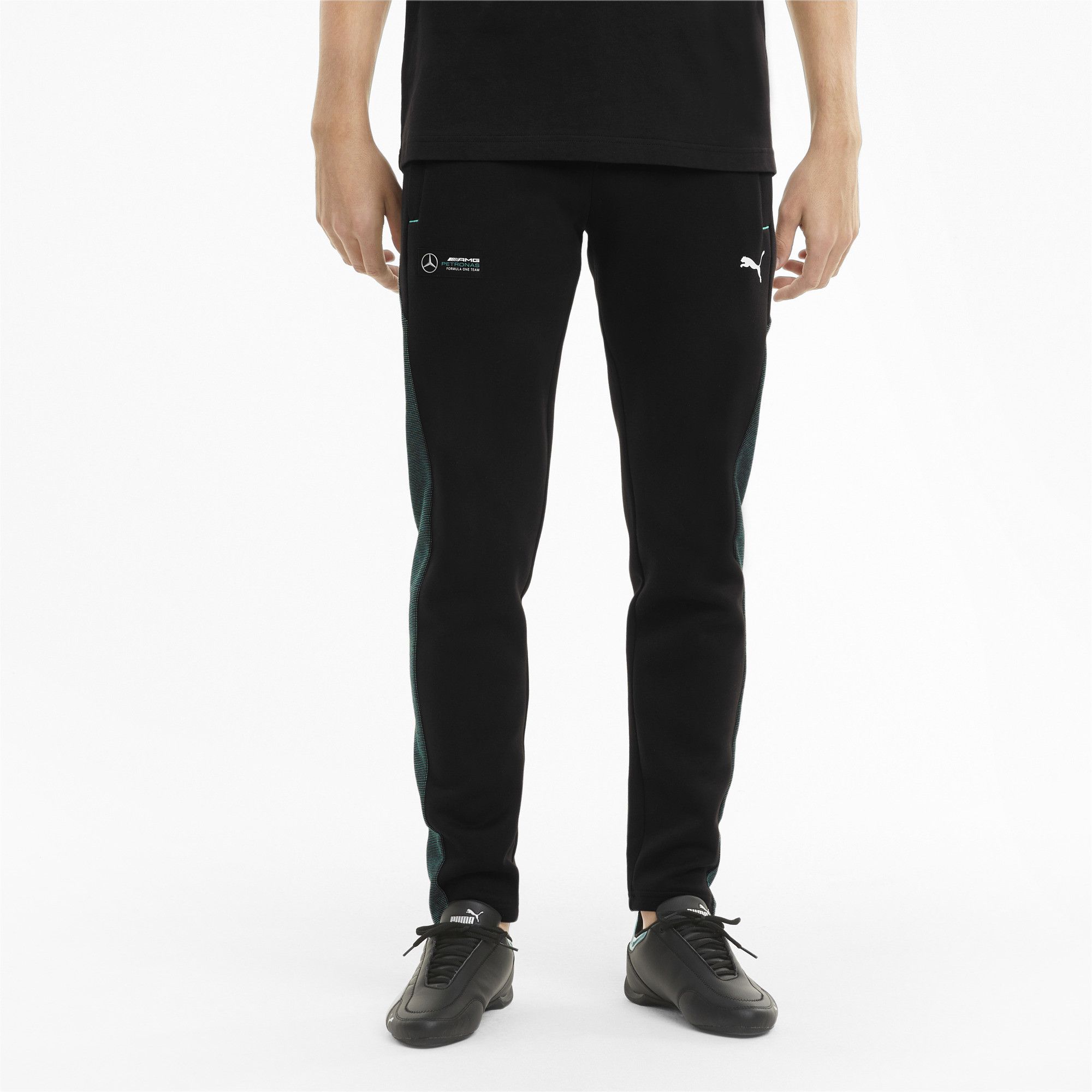 PRODUCT STORY

For high-octane fan style, these two-tone, double-sided sweatpants have a slim fit and showcase the Mercedes-AMG Petronas Motorsport badge and PUMA Cat Logo at the legs. The internal drawcord waistband and welt zip pockets are slick details that enhance the feeling of quality.

FEATURES & BENEFITS

By buying cotton products from PUMA, you’re supporting more sustainable cotton farming. 
DETAILS

Our model is 183 cm tall and is wearing size M
Slim fit
Open cuffs
Mercedes-AMG Petronas F1 badge at leg
PUMA Cat Logo at leg
Cotton and polyester