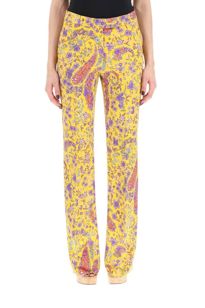 Etro tailored trousers in floral viscose envers satin. Regular fit with medium waist and slightly flared hem, side slash pockets, front concealed zip and hook closure. The model is 177 cm tall and wears a size IT 40.