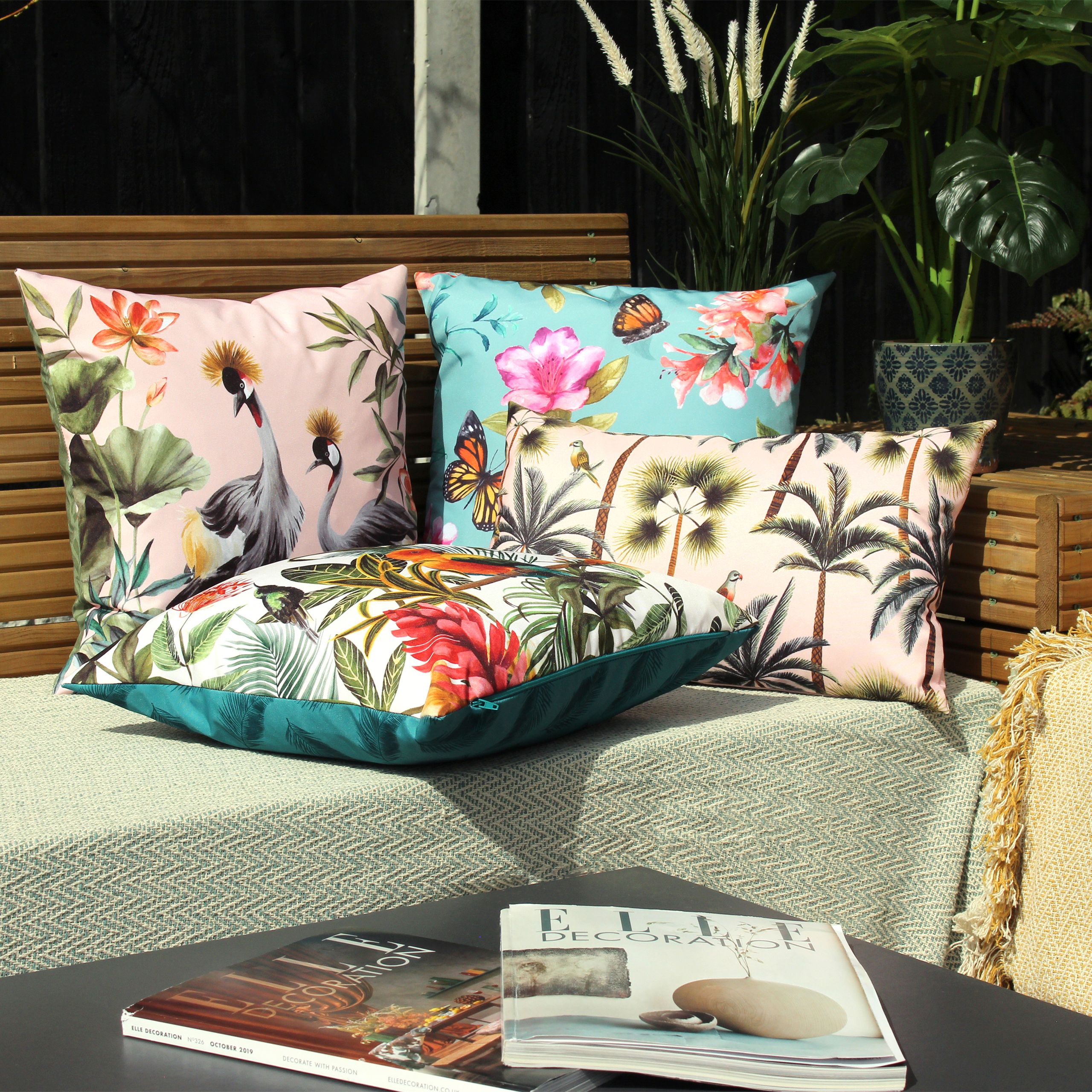 Bring the tropical feels to your outdoor space. This fully reversible design in beautiful pink and green tones is sure to stand out in any garden.