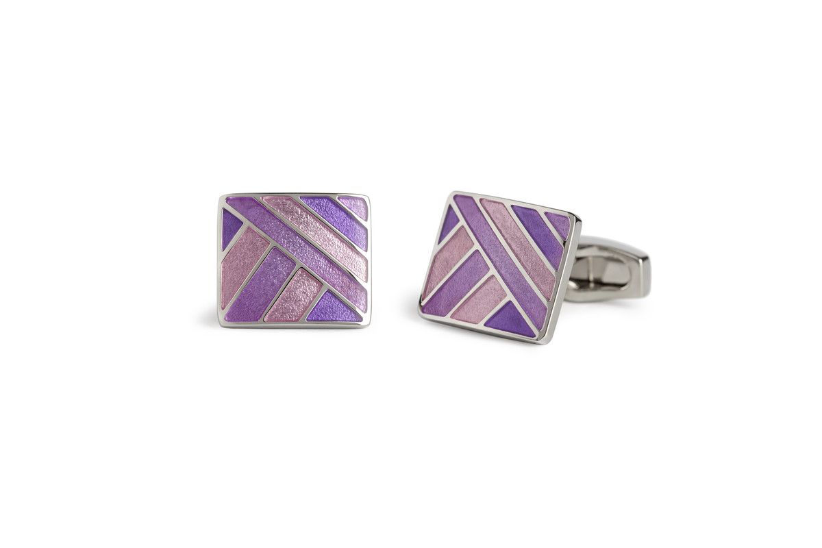 Here is a design in purple tones that plays with a few sculptural ideas.  Geometry is addressed in the capricious interplay of juxtaposing diagonal elements in an unusual harmony of 5 against 4.  I have also mixed the opacity of the enamel infilling material to vary the luminosity within the piece - a sort of hide and seek involving metal and colour.