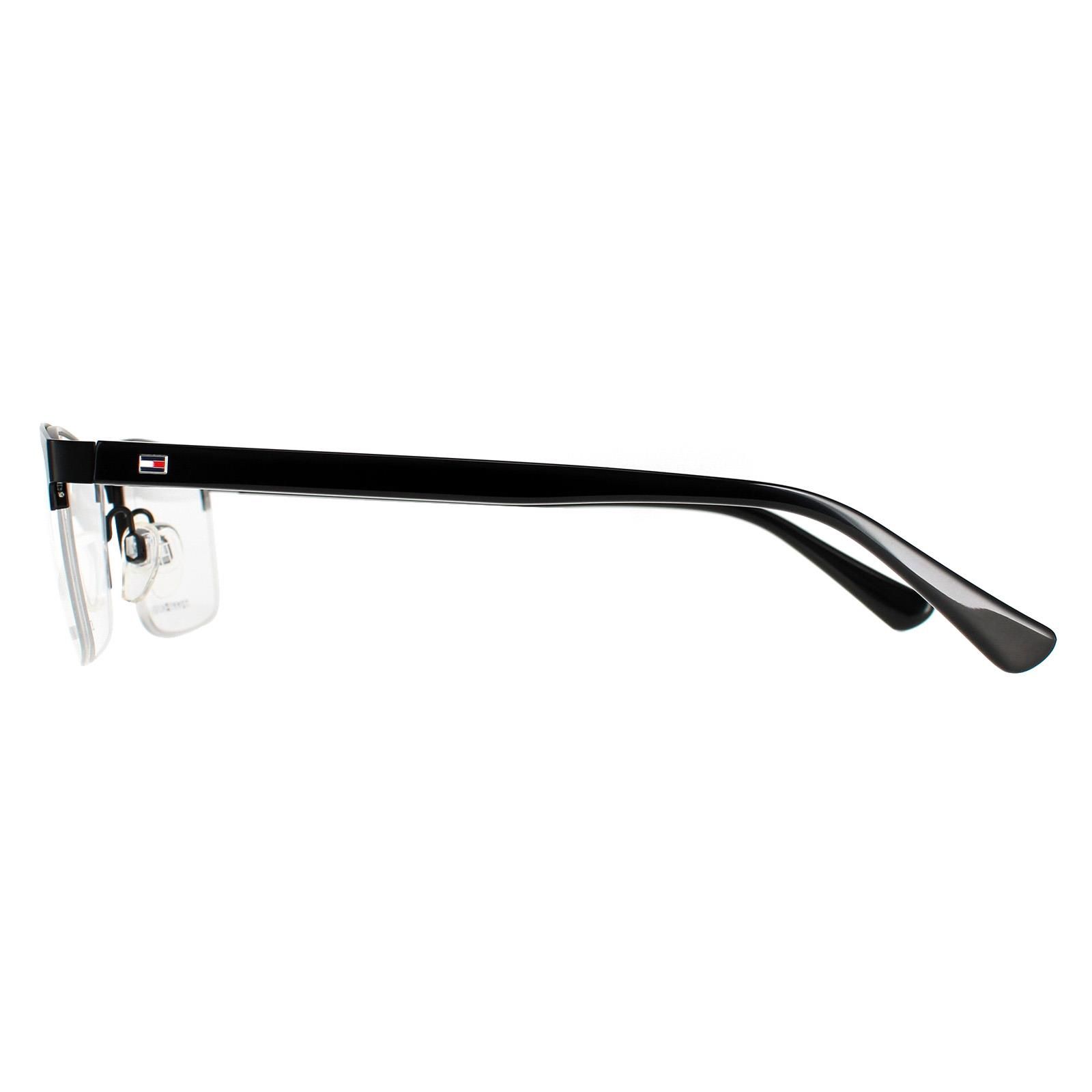 Tommy Hilfiger Half Rimless Mens Matte Black  TH 1528  Tommy Hilfiger are a semi rimless design with a metal frame front and plastic temples. Adjustable nose pads ensure comfort and the temples feature the Tommy Hilfiger flag logo.