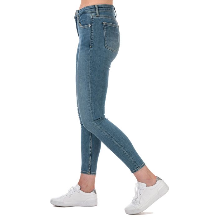 Womens Calvin Klein Jeans CKJ 010 High Rise Skinny Ankle Jeans in mid blue vintage wash.<BR><BR>- Classic 5 pocket styling. <BR>- Zip fly and button fastening. <BR>- CK monogram embroidery at back waist and coin pocket.<BR>- High waist - rise = 10in. <BR>- Skinny leg.<BR>- Skinny fit. <BR>- Inside leg length measures 28“ approximately.<BR>- 86% Cotton  13% Polyester  1% Elastane. Machine washable. <BR>- Ref: J20J2127491A4<BR><BR>Measurements are intended for guidance only.