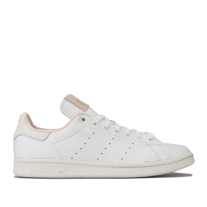 Adidas Originals Stan Smith Trainers in footwear white - crystal white.<br><br>- Premium leather upper.<br>- Lace closure.<br>- Perforated 3-Stripes to sides.<br>- Contrast heel patch with debossed Trefoil branding.<br>- Foil print brand patch on tongue.<br>- Synthetic leather lining to heel.<br>- Comfortable textile lining<br>- Removable cushioned sockliner.<br>- Rubber cupsole.<br>- Leather upper  Synthetic and textile lining  Synthetic sole.<br>- Ref: EF2099