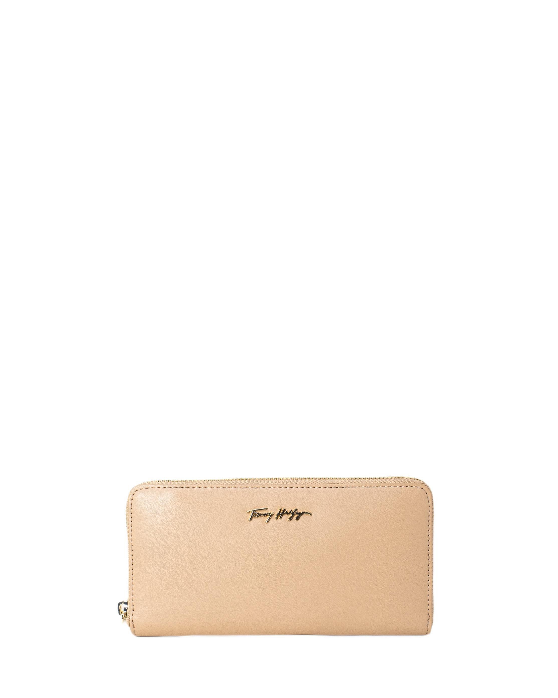 Brand: Tommy Hilfiger Gender: Women Type: Wallets Season: Spring/Summer  PRODUCT DETAIL • Color: pink • Pattern: plain • Fastening: with zip • Size (cm): 10.5x17x3.5 cm  COMPOSITION AND MATERIAL • Composition: -100%  polyurethane