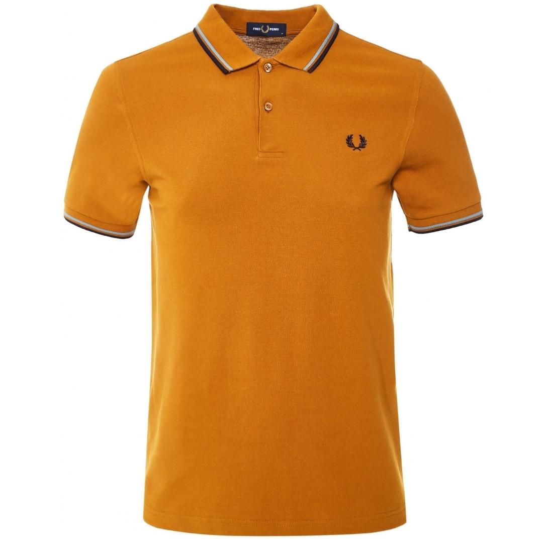Fred Perry Twin Tipped M3600 644 Brown Polo Shirt. Fred Perry Brown Polo Shirt. Logo On Chest. Button Closure At The Neck. Style: M3600 644. 100% Cotton