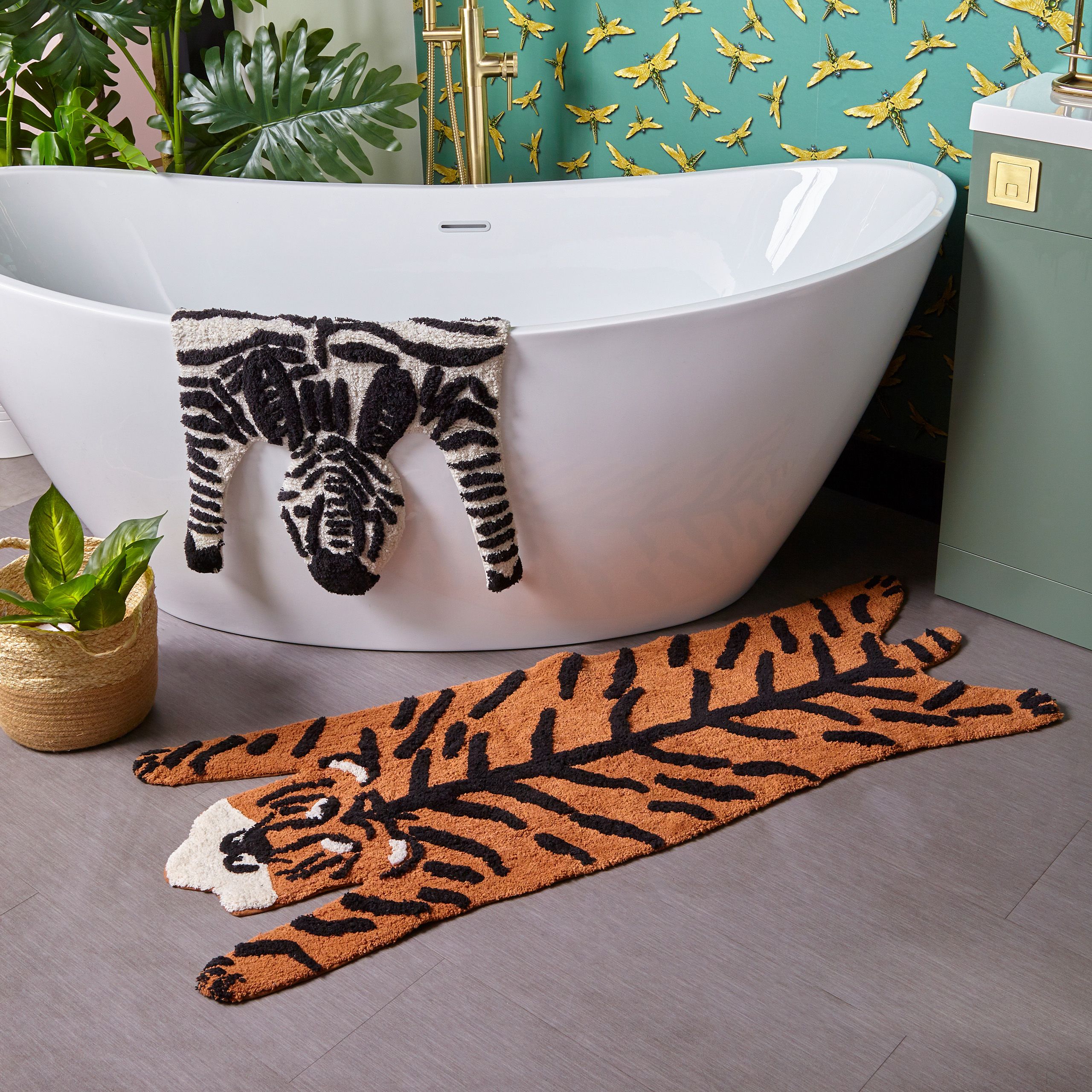 Featuring a bold tiger-shaped design, on soft burnt orange cotton fabric. Made from 100% Cotton, making this bath mat incredibly soft under foot. This bath mat has an anti-slip quality, keeping it securely in place on your bathroom floor. The 1800 GSM ensures this bath mat is super absorbent preventing post-bath or shower puddles.