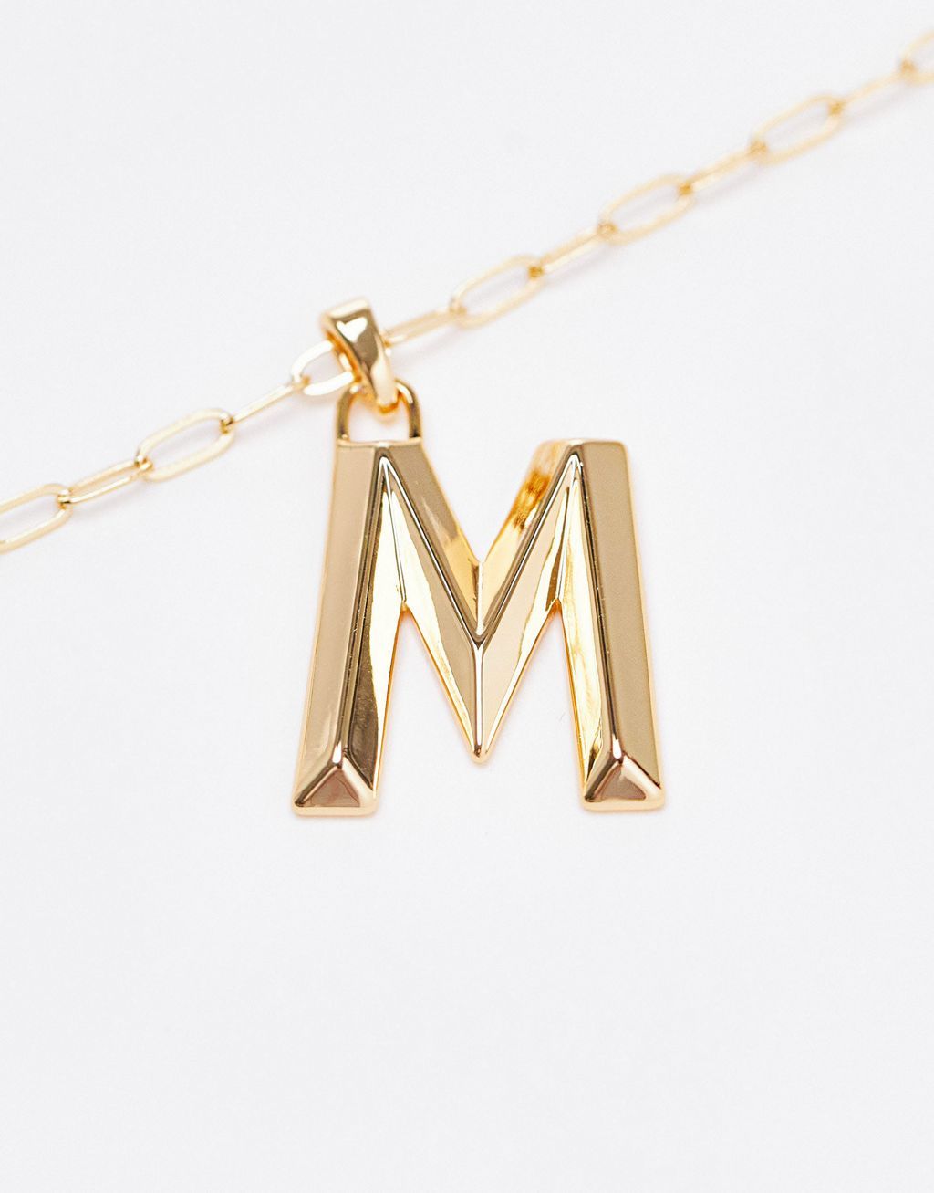 Accessories by Topshop Welcome to the next phase of Topshop Link chain 'M' pendant Adjustable length Lobster clasp Sold by Asos