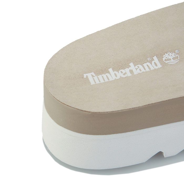 Womens Timberland Santa Monica Sunrise Slide Sandals in white. - Premium Full-Grain Leather. - Slip-on construction. - Synthetic suede lining. - Lightweight OrthoLite® footbed. - Midsole of EVA-blend foam for cushioning. - Ground-contact EVA outsole. - Leather upper  Textile and suede lining  Synthetic sole. - Ref.: CA24G6