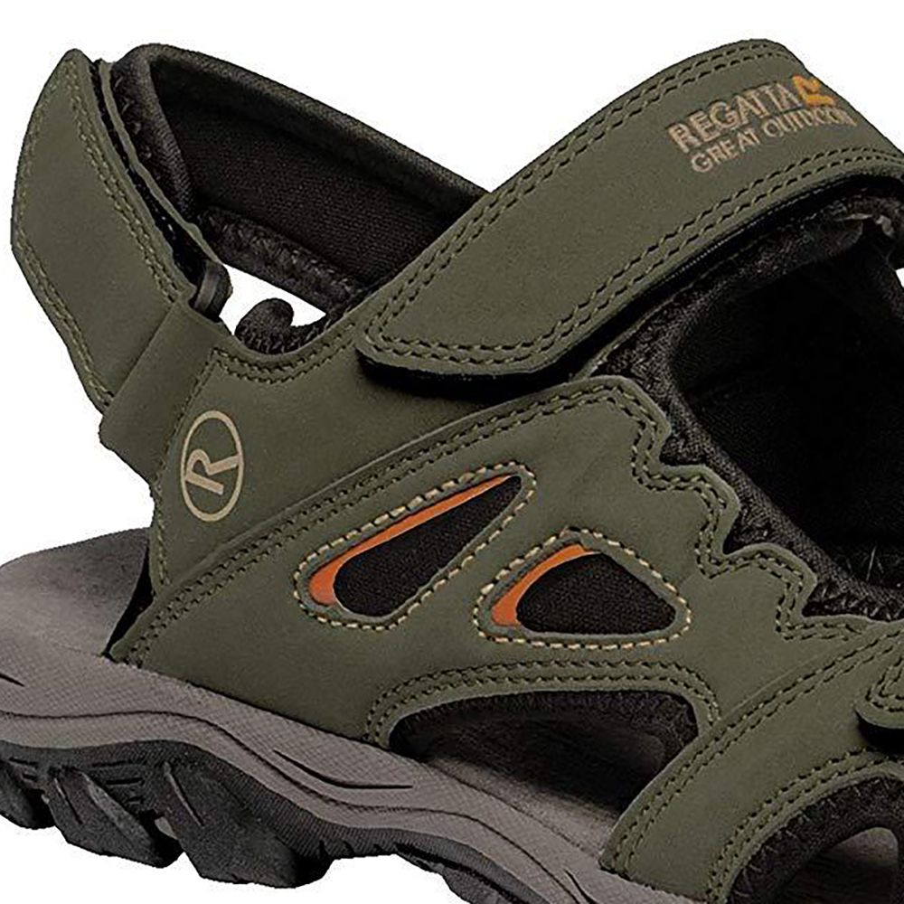 90% polyurathane, 5% polyester, 5% polyamide. Lightweight sports mesh and PU upper. Spandex lining for extra comfort and a positive fit. Adjustable hook and loop straps with webbing trim across foot and heel to ensure correct fit. Moulded instep stability arm. Water friendly comfort EVA footbed. Lightweight TPR outsole - hardwearing slip resistant durable outsole.