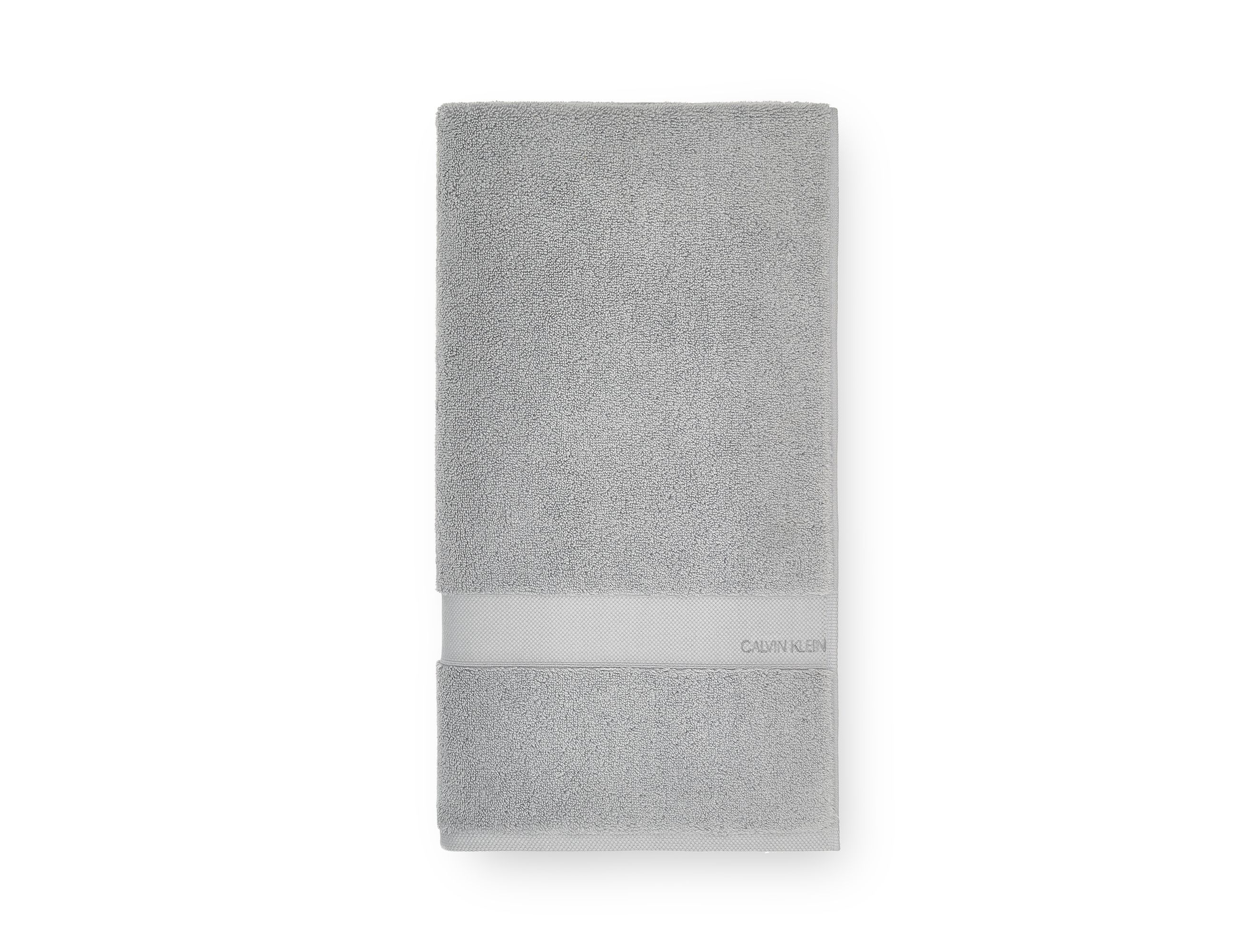 Supremely soft against the skin and equally absorbent the Tracy Towel Collection from Calvin Klein is a soothing way to begin and end the day. Made of fine 600 GSM 100% cotton these iconic towels feature the signature Calvin Klein logo and a flat band dobby border Available in a range of colours - white, beige, dusty blue, grey, midnight, wine, deep plum, charcoal and pink.