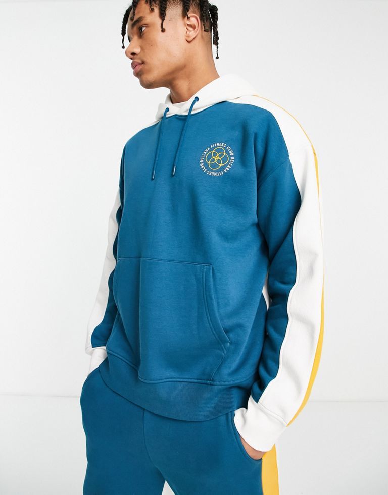 Hoodie by Topman Part of a co-ord set Joggers sold separately Colour-block design Drawstring hood Print to chest Pouch pocket Ribbed trims Relaxed fit Sold by Asos