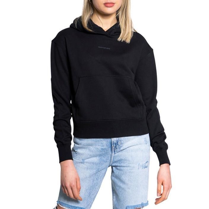 Brand: Calvin Klein Jeans
Gender: Women
Type: Knitwear
Season: Spring/Summer

PRODUCT DETAIL
• Color: black
• Pattern: plain
• Fastening: slip on
• Sleeves: long
• Collar: hood

COMPOSITION AND MATERIAL
• Composition: -100% cotton 
•  Washing: machine wash at 30°