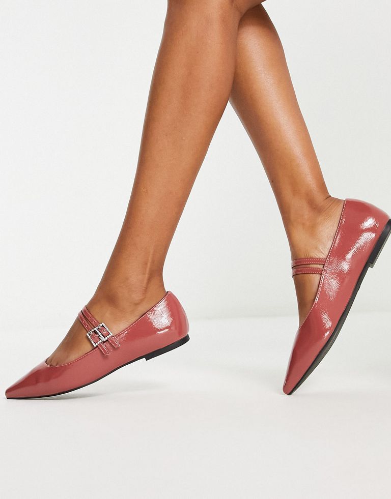 Shoes by ASOS DESIGN Next stop: checkout Adjustable straps Embellished pin-buckle fastenings Pointed toe Flat sole Sold by Asos