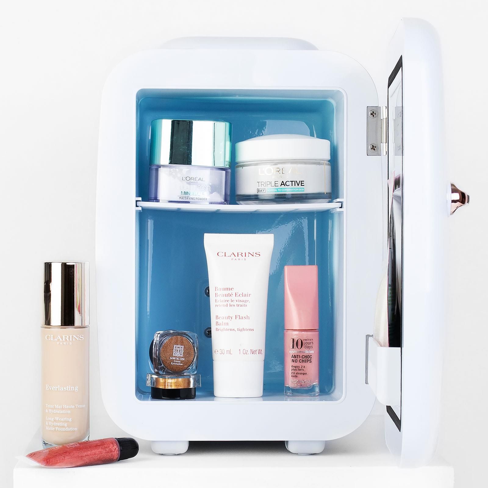 Keep your skincare and cosmetics fresher for longer with the envie Mini Beauty Fridge.  Helping to extend shelf life of your beauty products and reducing harmful bacteria, the cooling function is also ideal for maintaining cold snacks and beverages. 

Cooling products up to 20 degrees below room temperature, the fridge is sized to suit most skincare products, canned drinks and small drink cartons.

Key Features:
Removeable middle and door shelves
Thermoelectric system switches from cooling to warming
Warming function ideal for maintaining warm snacks and hot drinks
Suitable for bedrooms, office, camping, cars, caravans, boats
Stash your treats – perfect for student rooms and offices.  Keep your personal stash away from the hands of others!
Can hold up to 4 litres