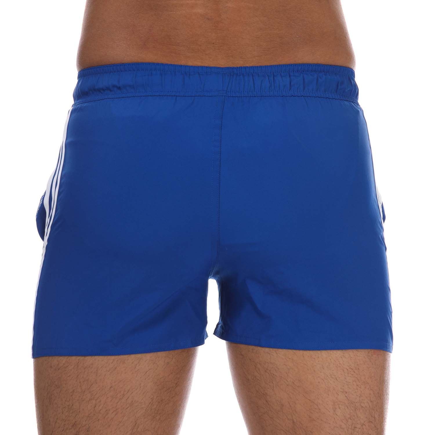 Mens adidas 3-Stripes CLX Swim Shorts in royal blue.- Drawcord on elastic waist.- Side pockets.- Mesh inner briefs.- Quick-drying.- 3-Stripes to sides.- Main Material: 100% Polyester (Recycled). Inner Brief: 100% Polyester (Recycled). - Ref: FJ3365