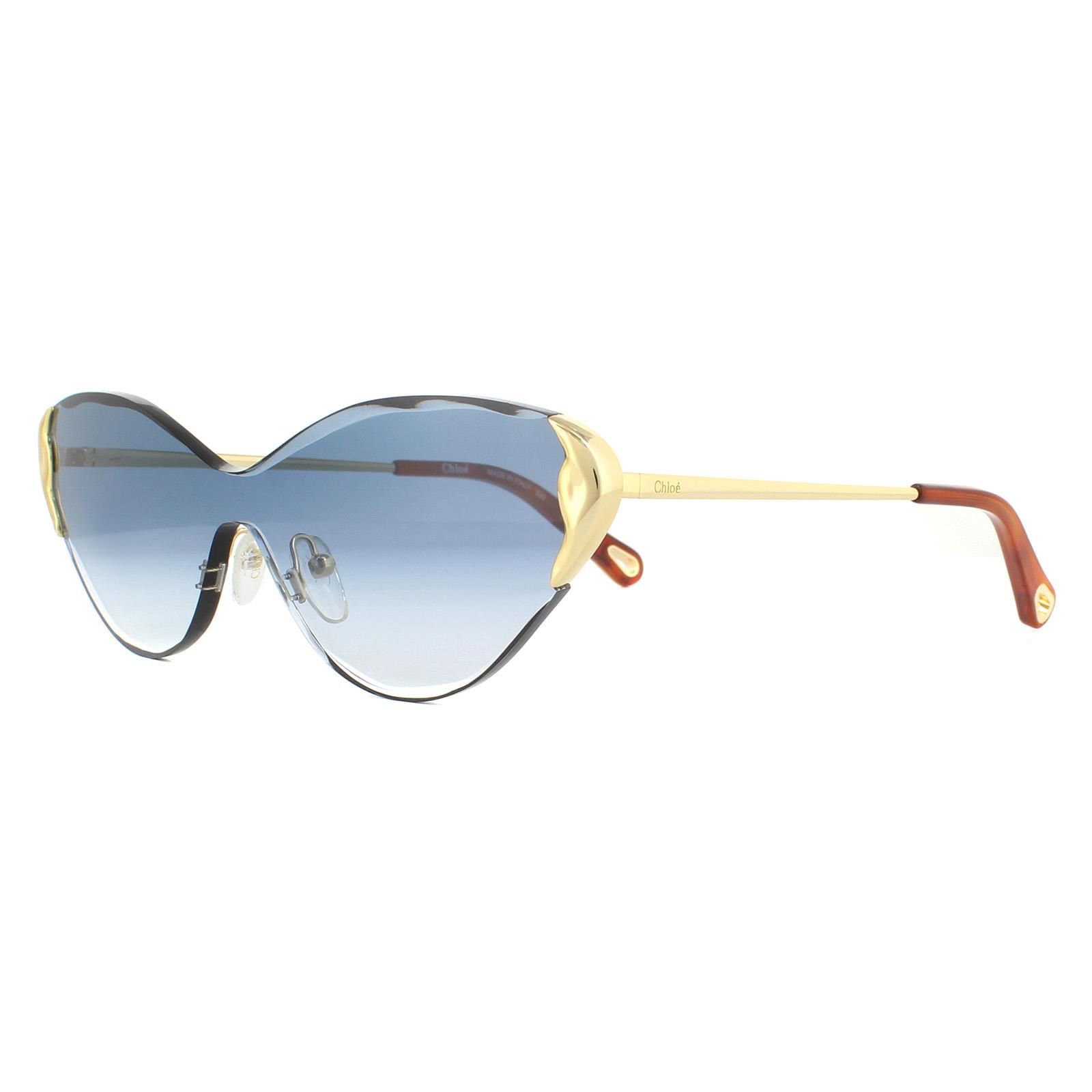 Chloe Sunglasses Curtis CE163S 816 Gold Blue Gradient are a gorgeous wide style with accentuated cat's eye look. The rimless sculptured lens is just stunning and matched perfectly with the metal temples that complete the top corners.