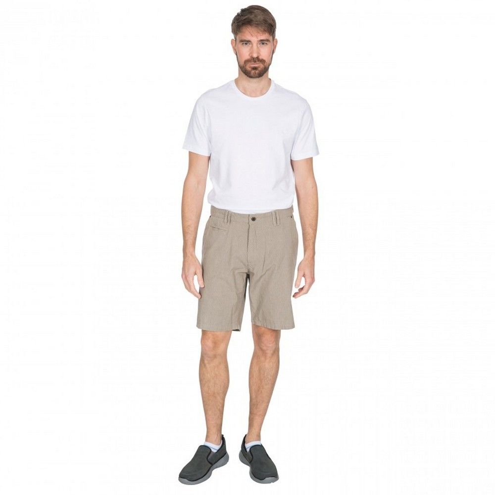 These shorts are comfortable, durable, lightweight and breathable. Featuring a longer length, flat waist with inner waist adjustment. Side entry pockets. Small money pocket  and rear jetted pockets secured by buttons. Woven check design. 100% Cotton.