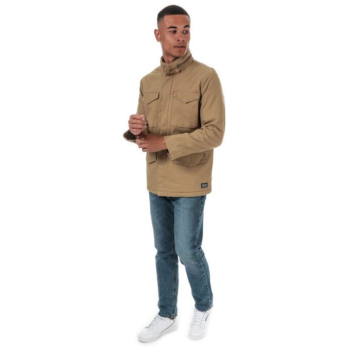 Mens Levi’s Sherpa Field Coat in harvest gold.<BR><BR>- Drawcord-adjustable hood; can be rolled away and zipped into collar.<BR>- Full zip fastening with storm placket.<BR>- Long sleeves with hook and loop adjustable cuffs.<BR>- Four flap pockets to front.<BR>- Adjustable drawcord at inner waist.<BR>- Warm Sherpa lining at body. <BR>- Fully lined.<BR>- Levi’s logo tabs at left chest pocket and above left hem.<BR>- Standard fit.<BR>- Body: 98% Cotton  2% Elastane.  Lining: 100% Polyester.  Filling: 100% Polyester.  Machine washable. <BR>- Ref: 85432-0000