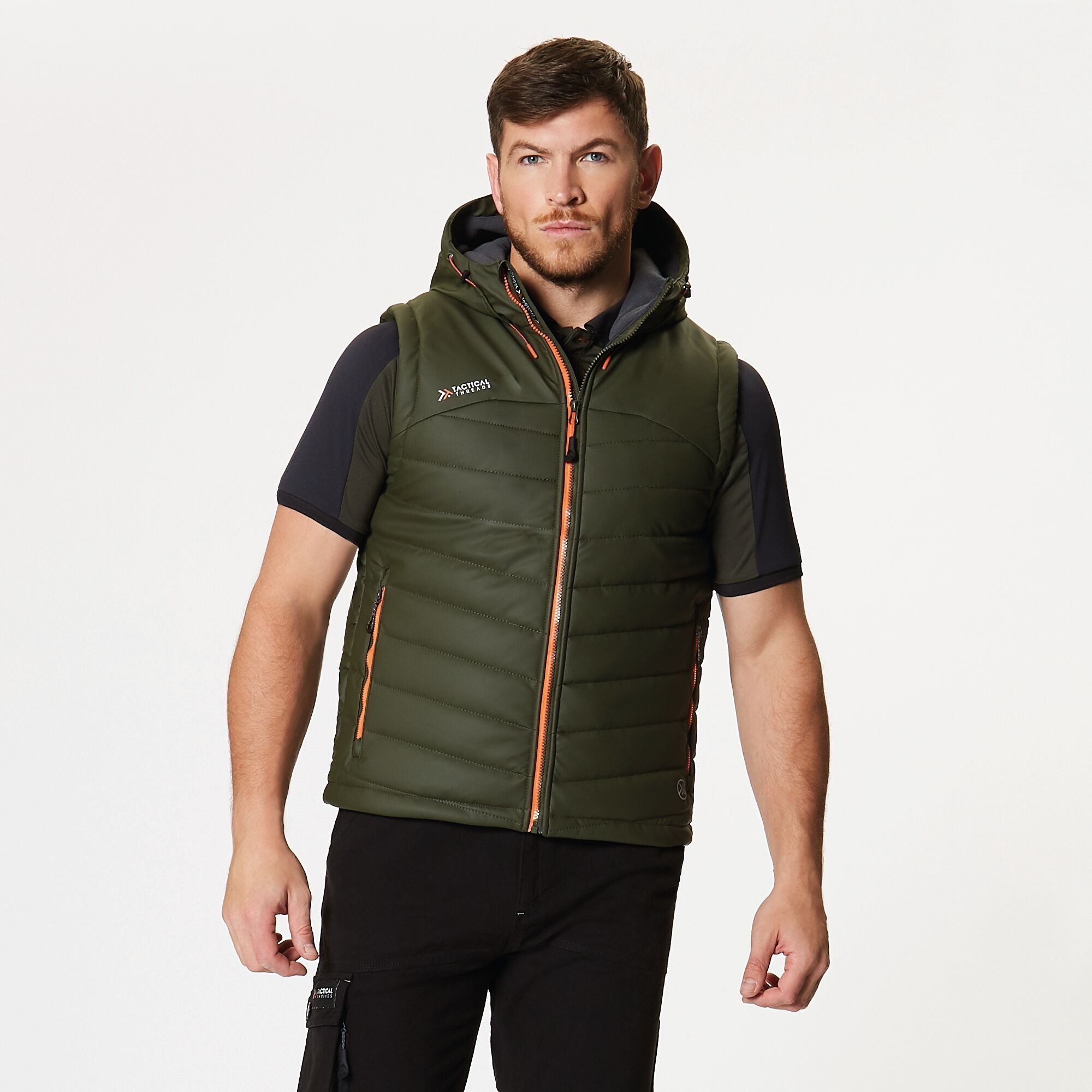 100% Polyester. Light weight and warm, thermo-guard wadding enables you to move freely, and four zipped pockets are perfect for your tape measure and other tools. When work is finished and the bar calls, the easy clean fabric can be wiped down for a fresh look. Water resistant and windproof PU coated polyester.