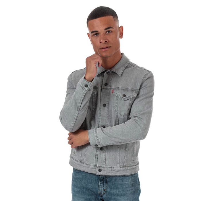 Mens Levi’s Reversible Flannel Lined Trucker Jacket in grey.<BR><BR>- Classic collar.<BR>- Full button placket with branded metal shanks.<BR>- Button cuffs.<BR>- Button-flap chest pockets.<BR>- Side hand pockets.<BR>- Back waistband tabs for an adjustable fit.<BR>- Checked flannel lining; reversible for a versatile look.<BR>- Classic fit.<BR>- Main material: 99% Cotton  1% Elastane.  Machine washable.<BR>- Ref: 85898-0000