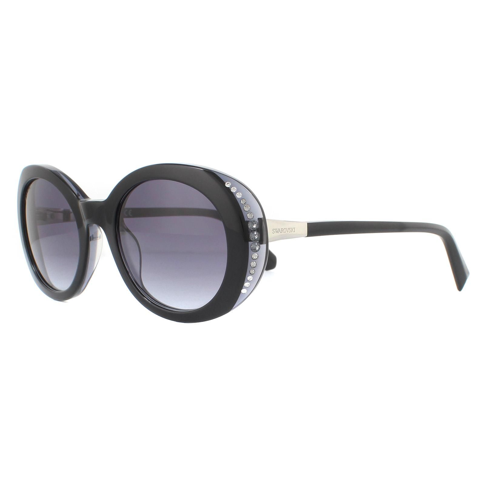 Swarovski Sunglasses SK0281/S 05B Black Grey Gradient are an elegant oval design crafted from lightweight acetate and embellished with Swarovski crystals on the outer edges of the frame with Swarovski logos engraved into the hinges.
