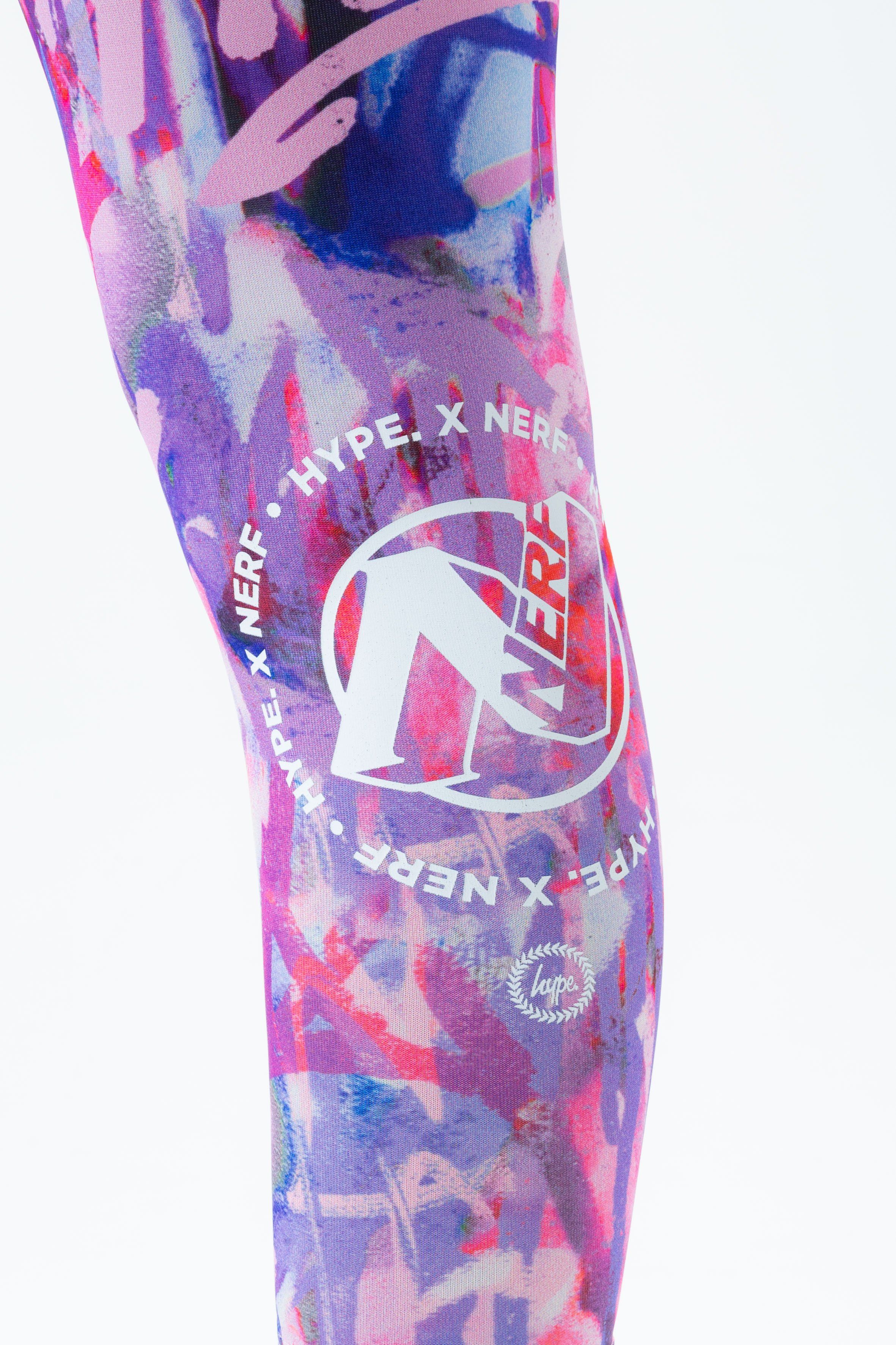 Let us introduce you to the HYPE. x NERF Purple Graffiti Kids Leggings. Featuring the collaborations' core graffiti inspired all-over-print in a purple and pink colour palette. With an elasticated waistband for the perfect wear in our standard girls leggings shape. Wear with an oversized tee for a casual look. Machine wash at 30 degrees.
