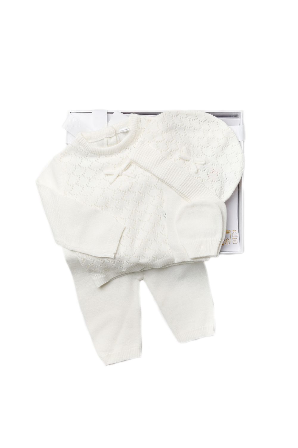 This Rock A Bye Baby Boutique four-piece set features a knitted jumper, bottoms, a hat, and mitts. The knitted cardigan has an adorable bow motif, matching the hat. The trousers are matching, with an elasticated waistband. This piece is perfect for keeping your little one comfortable and cosy. The Rock a Bye Baby Boutique line aims to offer a specialty baby collection with adorable detailing and comes in lovely, boxed packaging, making this a lovely gift for the little one in your life.