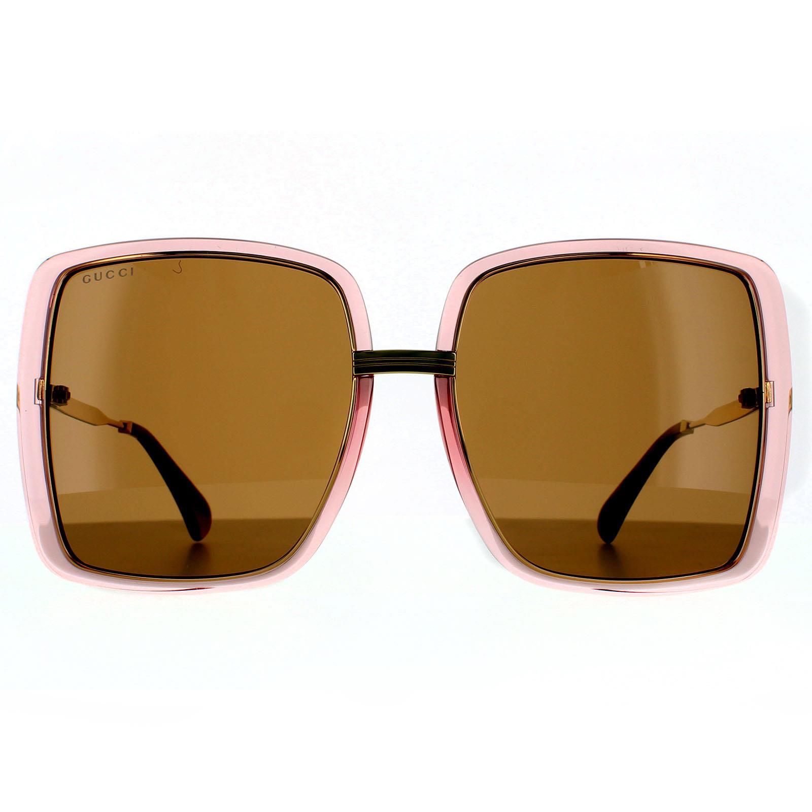 Gucci Square Womens Pink Crystal and Gold  Brown Sunglasses Gucci have super oversized square lenses with plastic rims and contrasting slim metal temples and bridge. Stripes are engraved into the  metal, as well as the Gucci logo on the temples.