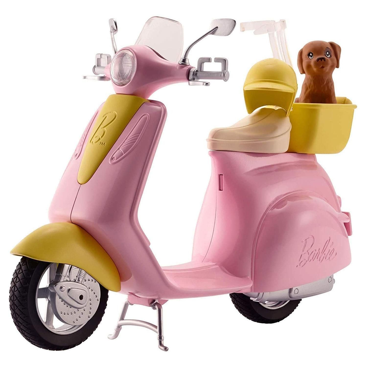 Scoot into fun with this Barbie moped. It comes with a pet friend who's always ready to ride! Designed in pink and yellow with silvery accents, the moped is trendy and stylish. Place Barbie doll (sold separately) on the seat where a clip holds her in place. Lift up the kickstand and push to head into imagination. Bring along the puppy in the yellow basket on the back. And a yellow helmet for the Barbie doll lets her ride safely in style. Whether you are going for a short ride or driving into adventure, this moped is ready to roll! Includes Barbie moped with basket, puppy, and helmet; doll not included. Colors and decorations may vary.
