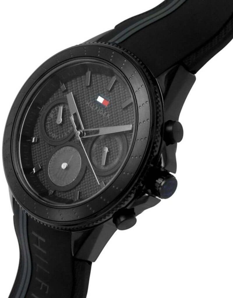 This Tommy Hilfiger Aiden Multi Dial Watch for Men is the perfect timepiece to wear or to gift. It's Black 44 mm Round case combined with the comfortable Black Silicone will ensure you enjoy this stunning timepiece without any compromise. Operated by a high quality Quartz movement and water resistant to 5 bars, your watch will keep ticking. Thanks to its ultra-soft silicone strap and its iridescent dial, it will bring a fashionable and modern touch to all your outfits!The choice is yours! -The watch has a calendar function: Day-Date, 24-hour Display High quality 21 cm length and 24 mm width Black Silicone strap with a Buckle Case diameter: 44 mm,case thickness: 12 mm, case colour: Black and dial colour: Black