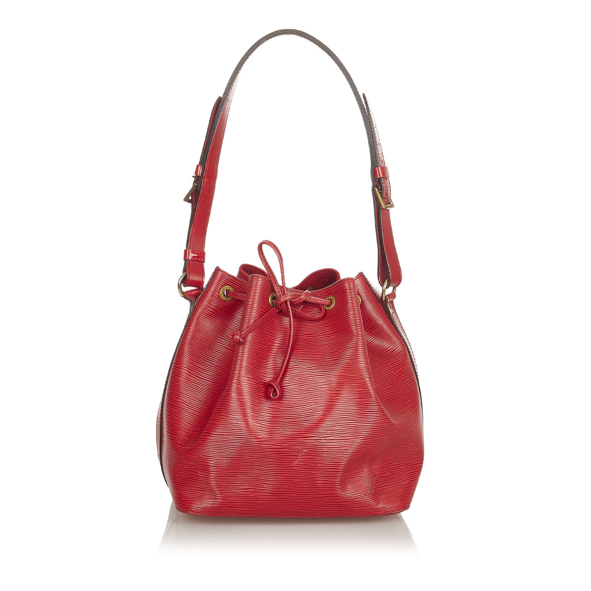VINTAGE. RRP AS NEW. The Noe features an epi leather body, an adjustable shoulder strap, a drawstring closure, Alcantara lining, and an interior zip pocket.Exterior back is discolored and stained. Exterior bottom is discolored. Exterior corners is discolored and scratched. Exterior front is discolored and stained. Exterior handle is discolored and stained. Exterior side is discolored. Buckle is scratched and tarnished.

Dimensions:
Length 27cm
Width 25cm
Depth 19cm
Shoulder Drop 38cm

Original Accessories: This item has no other original accessories.

Color: Red
Material: Leather x Epi Leather
Country of Origin: FRANCE
Boutique Reference: SSU166284K1342


Product Rating: GoodCondition

Certificate of Authenticity is available upon request with no extra fee required. Please contact our customer service team.