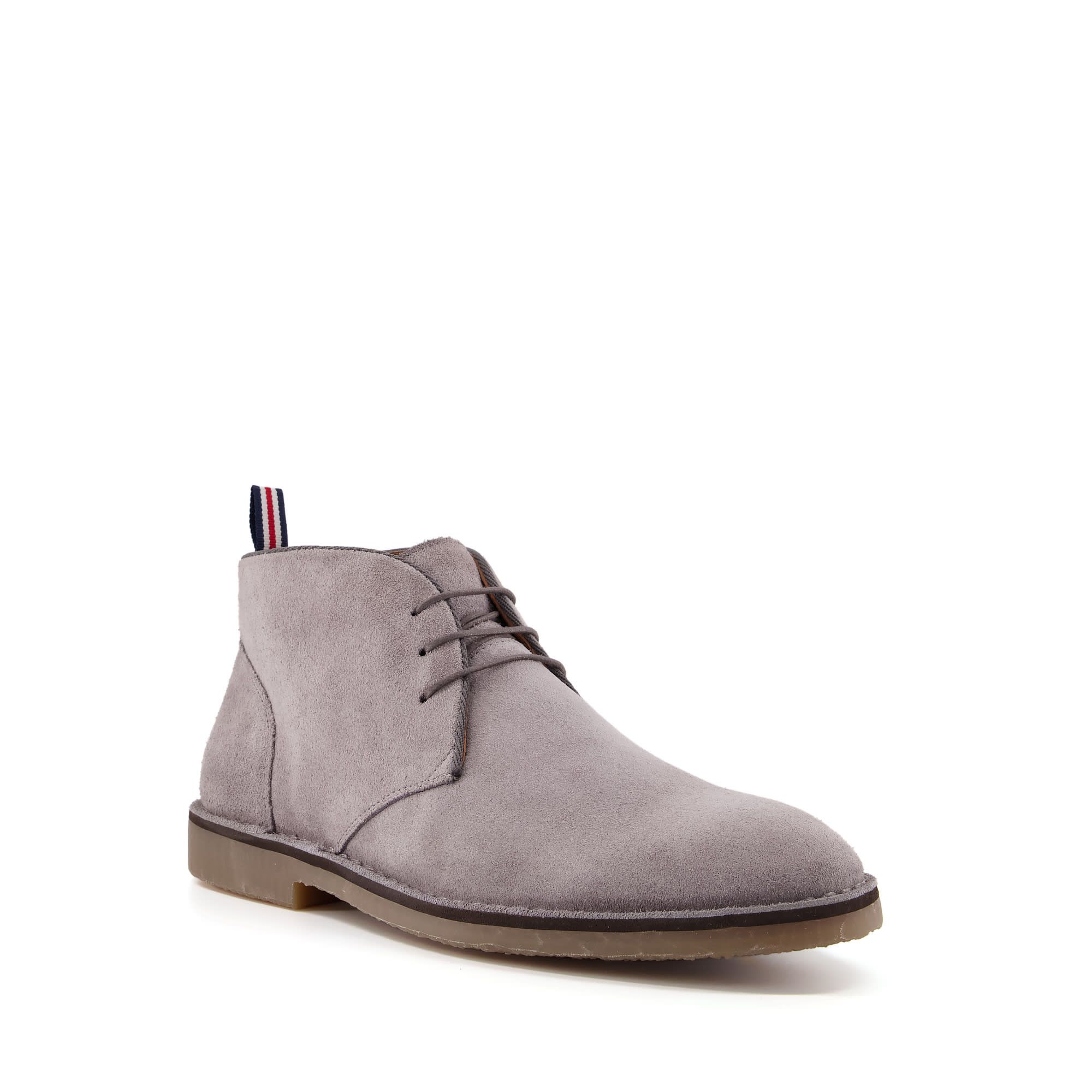The perfect go-to for everyday casual styling. These versatile desert boots slip on easily thanks to the back pull tab feature. Fastened with lace ups and featuring a practical rubber sole.