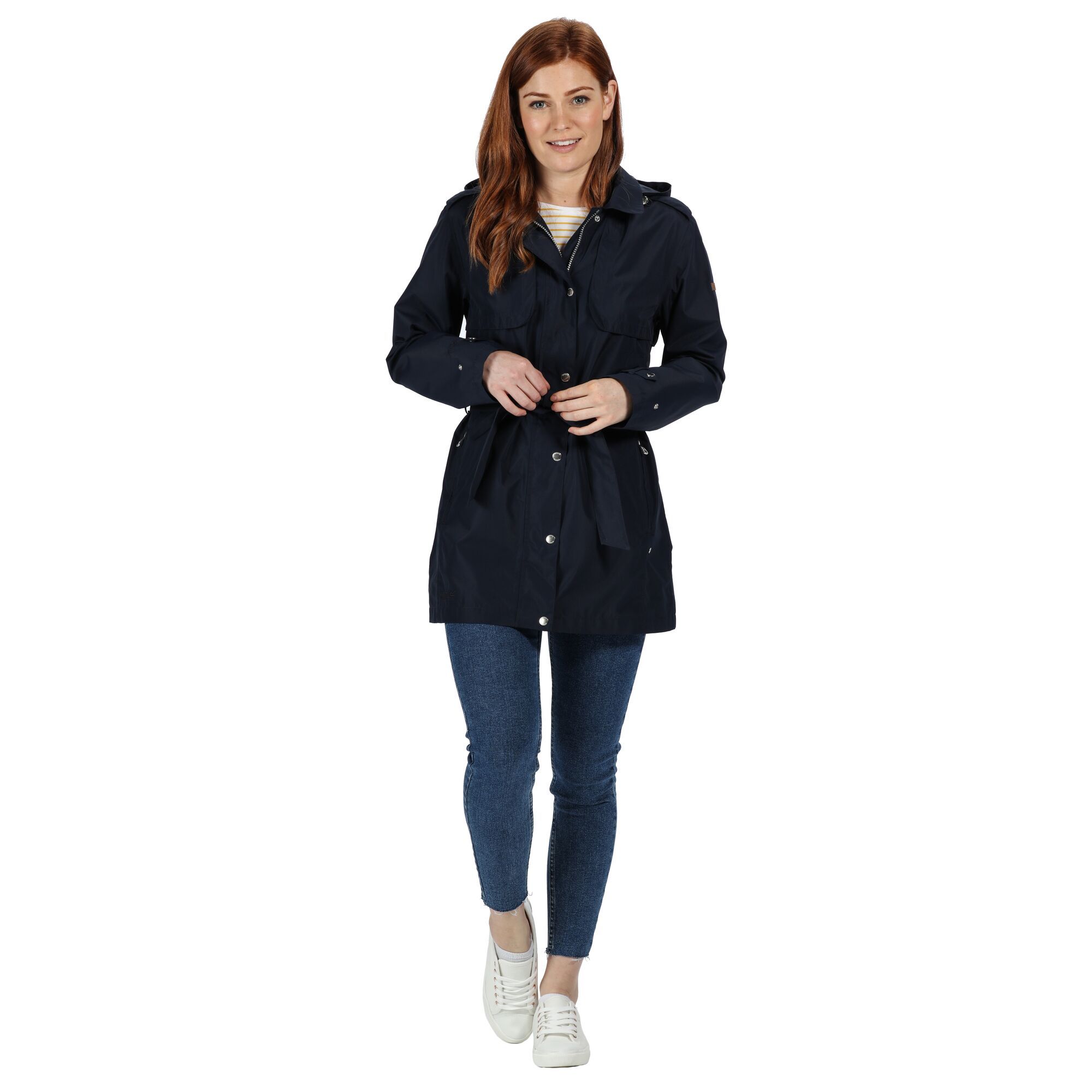Material: 100% polyester. Breathability rating 5,000g/m2/24hrs. Durable water repellent finish. Taped seams. Polyester taffeta lining. Cotton chambray with polka dot print trim. Internal security pocket. Zip off hood with adjusters and turn down collar. Tie belt at waist. 2 zipped lower pockets.