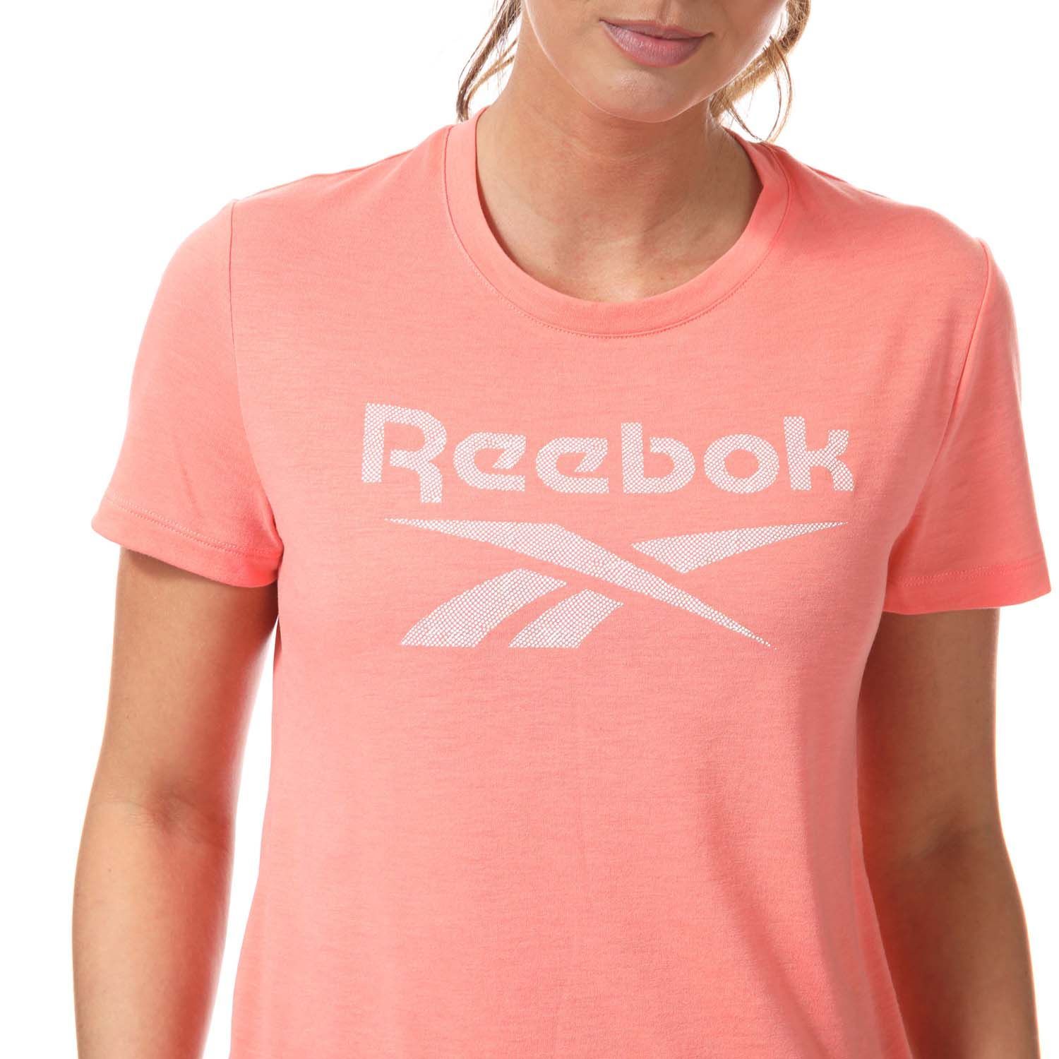 Womens Reebok Workout Ready Supremium Big Logo T- Shirt in coral.-Crew neck.- Short sleeves.- Supremium fabric offers lightweight comfort.- Reebok branding to the chest.- Speedwick fabric wicks sweat to help you stay cool and dry.- Slim fit.- Main Material: 65% Polyester  35% Rayon. - Ref: GI6865