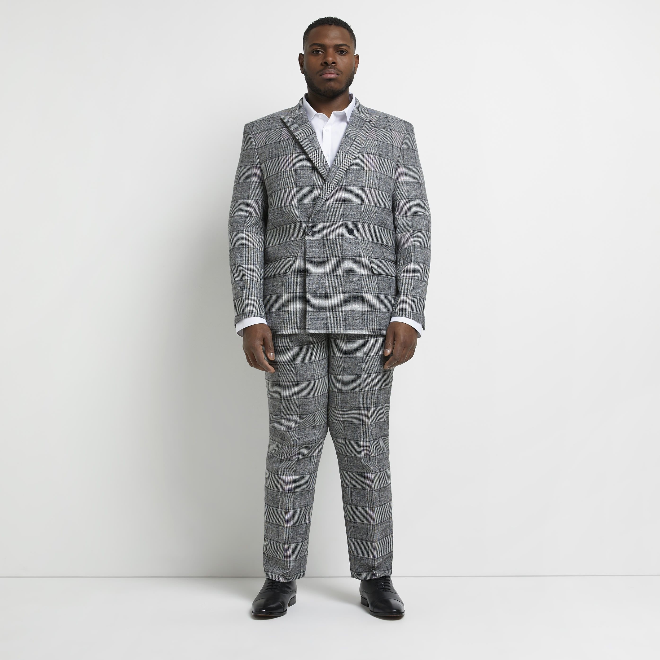 > Brand: River Island> Department: Men> Material: Polyester> Material Composition: 69% Polyester 30% Viscose 1% Elastane> Type: Suit Jacket> Style: 2 Piece> Size Type: Big & Tall> Fit: Slim> Jacket Lapel Style: Peak> Jacket Front Button Style: Two-Button> Pattern: Check> Occasion: Formal> Selection: Menswear> Season: AW21