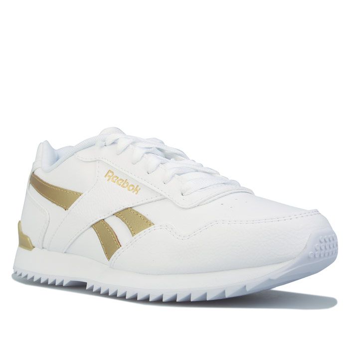 Womens Reebok Classics Royal Glide Ripple Clip Trainers in White Gold. – Synthetic upper. – Low-cut design for a sleek and sophisticated silhouette. – Shimmering stripes make the look stand out. – Heel clip carries through the polished look. – EVA midsole provides cushion. – Rippled outsole provides traction. – Leather and Synthetic upper – Textile lining – Synthetic sole. – Ref: BS5818
