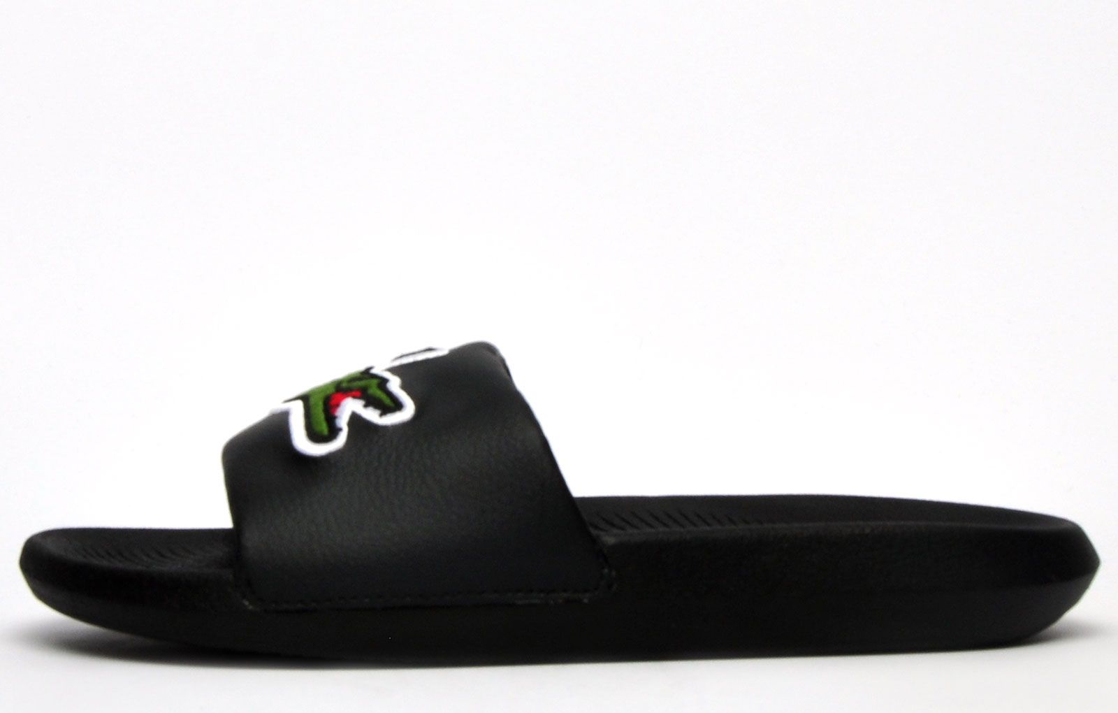 Step into eye catching summer style with these mensCroco Slides from Lacoste. In a bang on trend colourway, these designer sandals are delivered in a smooth synthetic upper with croc detailing across the forefoot foot strap. The stylish upper delivers a super comfy footbed which moulds to your feet delivering the perfect fit and feel while the grippy outsole will keep you sure and safe around the pool or in the shower. These designer slides are finished with eye catching Lacoste branding throughout just in case you want a sign of approval that youre wearing cool on-trend style this summer season 
 
 - Stylish synthetic upper
 - Comfort moulded footbed
 - Grippy outsole
 - Slip on wear
 - Iconic Lacoste branding throughout
 Please Note: These slides are supplied poly bagged (without box)
 These Lacoste Slides are sold as B grades which means there may be some very slight cosmetic issues on the shoe and they come in a poly bag. There could be occasional issues with wrong swing tags being allocated to wrong shoes by Lacoste themselves which could result in some size confusion but you must take the size IN THE SHOE as the size that the shoe actually is ( not what is on the tag ). We have checked most of the shoes and in our opinion,all are practically perfect without any blemishes on them at all and in essence if the shoes did not have the letter B denoted on the swing tag you would presume these were perfect shoes. All shoes are guaranteed against fair wear and tear and offer a substantial saving against the normal high street price. The overall function or performance of the shoe will not be affected by any minor cosmetic issues. B Grades are original authentic products released by the brand manufacturer with their approval at greatly reduced prices. If you are unhappy with your purchase, we will be more than happy to take the shoes back from you and issue a full refund