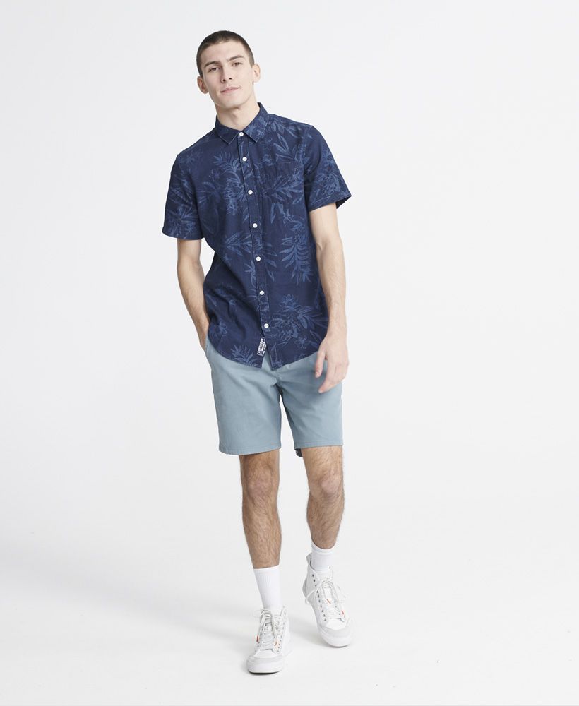 Superdry men's Miami Loom short sleeve shirt. This shirt features a button down fastening, short sleeves, an all over print design and one chest pocket. Finished with a Superdry logo patch on the placket. Will look great worn on its own or layered over a plain tee.
