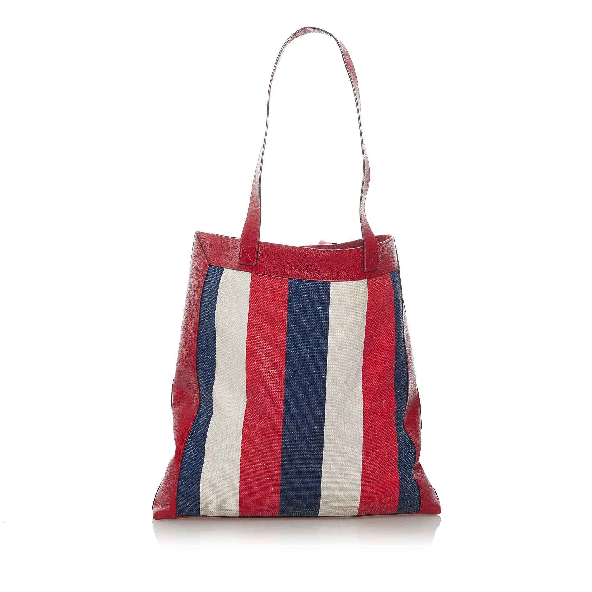 VINTAGE. RRP AS NEW. The 2018 Logo Striped tote bag features a printed canvas body with leather trim, a flat leather straps, an open top, and an interior zip pocket.Exterior back is discolored, out of shape and scratched. Exterior bottom is out of shape. Exterior corners is scratched. Exterior front is discolored, out of shape, scratched and stained. Zipper is scratched and tarnished. Interior lining is discolored.

Dimensions:
Length 43cm
Width 40cm
Depth 7cm
Hand Drop 29cm
Shoulder Drop 29cm

Original Accessories: Dust Bag

Serial Number: 523781
Color: Red x Multi
Material: Fabric x Canvas x Leather x Calf
Country of Origin: Italy
Boutique Reference: SSU156728K1342


Product Rating: GoodCondition

Certificate of Authenticity is available upon request with no extra fee required. Please contact our customer service team.