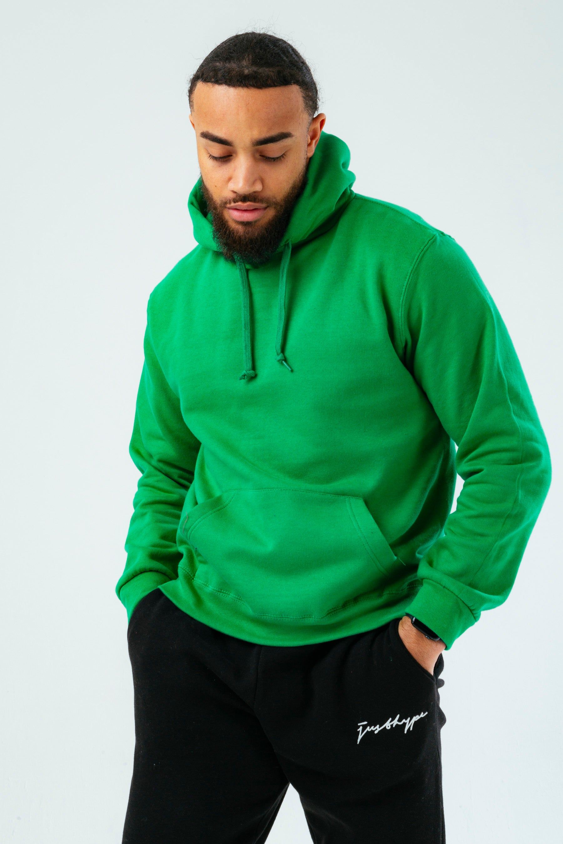 The HYPE. Unisex Pullover Hoodie boasts a soft touch fabric base for supreme comfort. Designed in our standard unisex pullover shape, with a fixed hood, kangaroo pocket, elasticated hem and ribbed cuffs. The model wears a size M. If you like an oversized fit, go up a size, if you like a tight fit go down a size, for a standard fit, select your usual size. Machine wash at 30 degrees.
