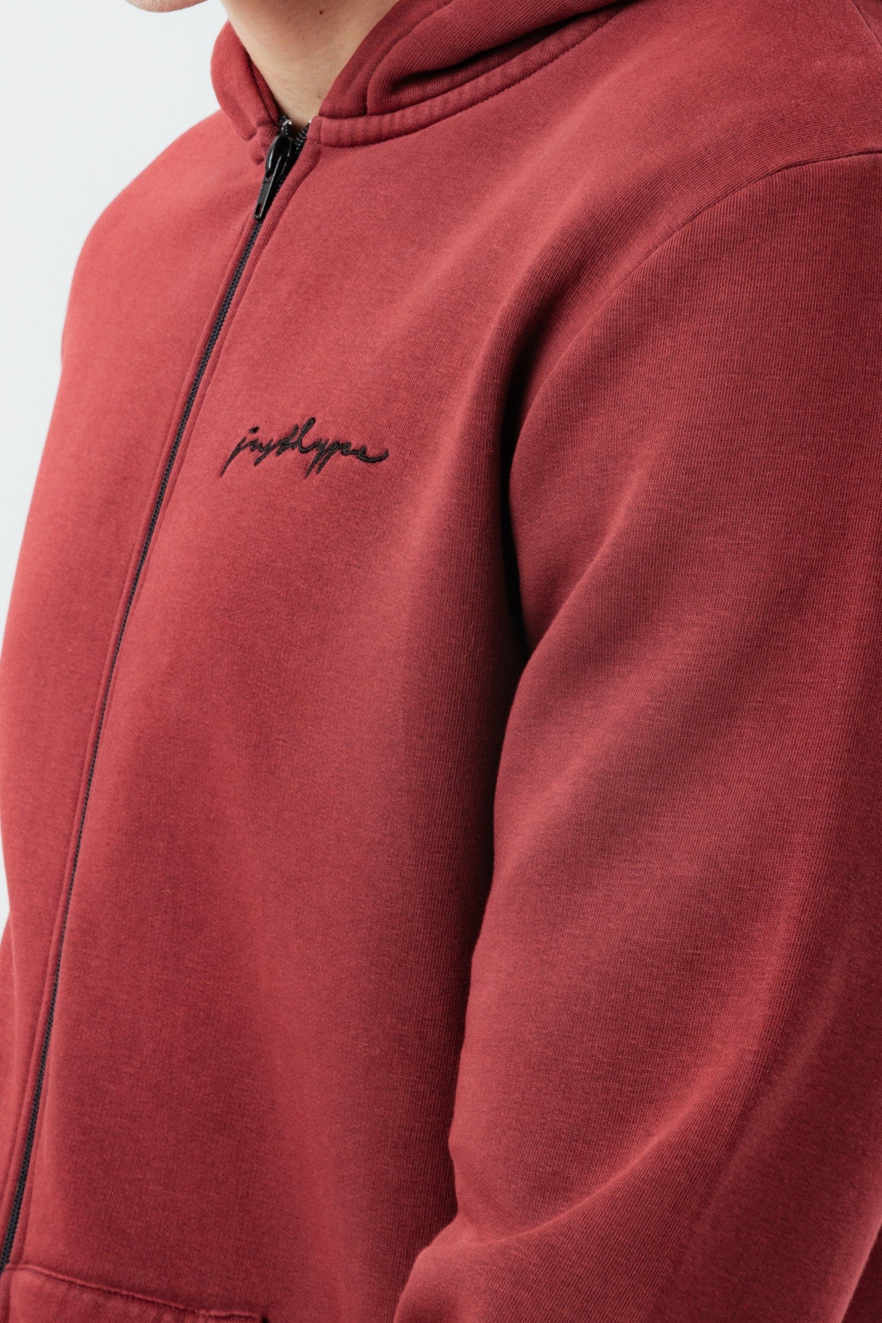The HYPE. Men's Pullover Zip Hoodie boasts a soft touch fabric base for supreme comfort. Designed in our standard men's pullover shape, with a fixed hood, embossed zip puller, double pockets, elasticated hem and ribbed cuffs. The model wears a size M. If you like an oversized fit, go up a size, if you like a tight fit go down a size, for a standard fit, select your usual size. Machine wash at 30 degrees.
