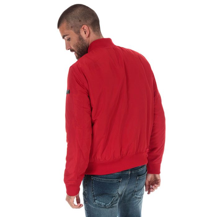 Mens Armani Exchange Utility Bomber Jacket in Red.<BR>- Full zip fastening.<BR>- Elasticated cuffs & hem.<BR>- 2 popper button pockets to side.<BR>- Branded rivets on back pockets<BR>- Armani Exchange logo to sleeve.<BR>- 100% Polyester  Machine Washable.<BR>- 8NZB61ZND1Z140