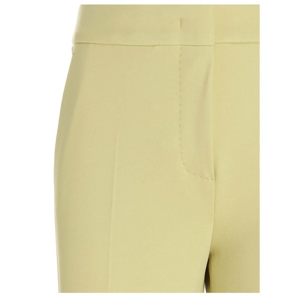 Pegno' pants in bi-stretch viscose featuring a zip, hook and button fastening.