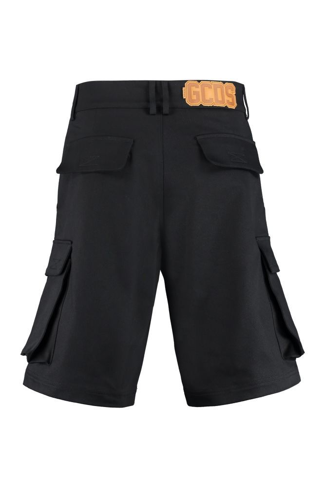 Cotton Cargo Shorts by GCDS, adjustable drawstring waist, two side pockets with contrasting printed logo, belt loops, two back purse pockets.