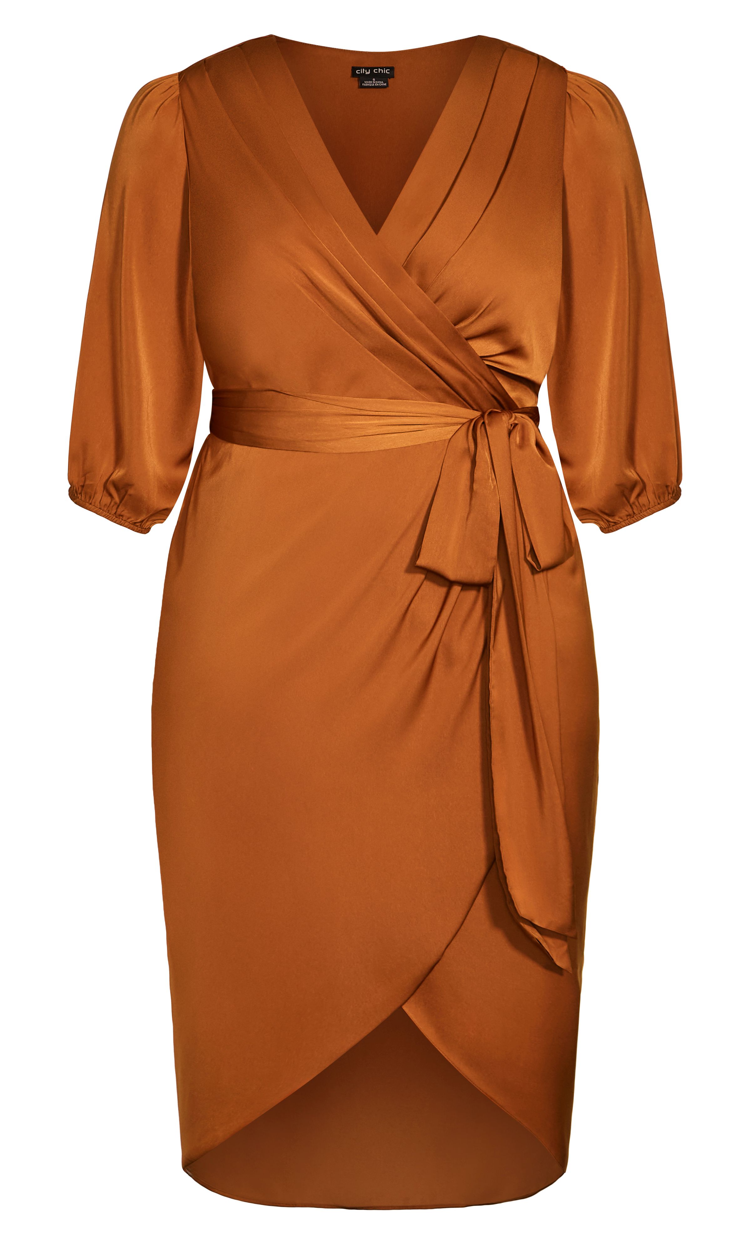 Drape your curves in the luxurious silhouette of our Opulent Elbow Sleeve Dress, dipped in a glamorous caramel hue. This seriously elegant ensemble offers a faux wrap appearance with puffed sleeves and a sweet tulip hem. Key Features Include: - Faux wrap V-neckline - Elbow length puff sleeves with elasticated cuff - Removable self-tie waist belt - Half-elasticated waist - Lined skirt - Luxurious shiny satin fabrication - Pullover style - Midi length tulip hemline Try adding some gold accessories for some extra 'oomph'! A pair of strappy heels and delicate jewellery should do just the trick.