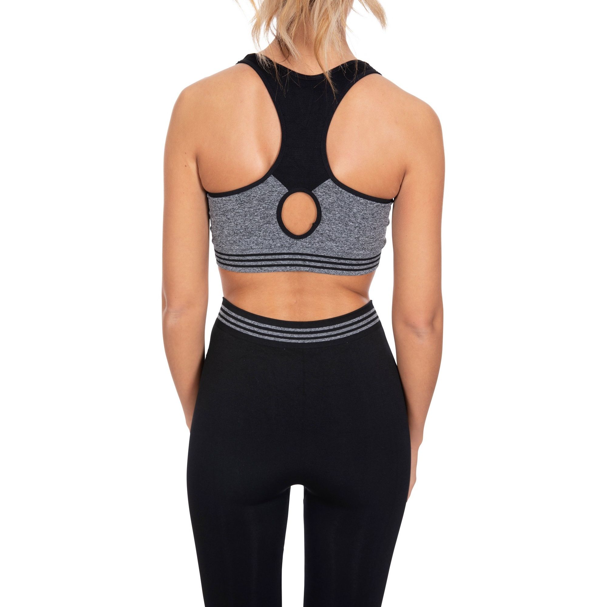 56% Polyamide, 36% Polyester, 8% Elastane. Seamless bra top. Contrast panels. Removable bust pads. Cut out detail at back. Wicking. Trespass Womens Chest Sizing (approx): XS/8 - 32in/81cm, S/10 - 34in/86cm, M/12 - 36in/91.4cm, L/14 - 38in/96.5cm, XL/16 - 40in/101.5cm, XXL/18 - 42in/106.5cm.