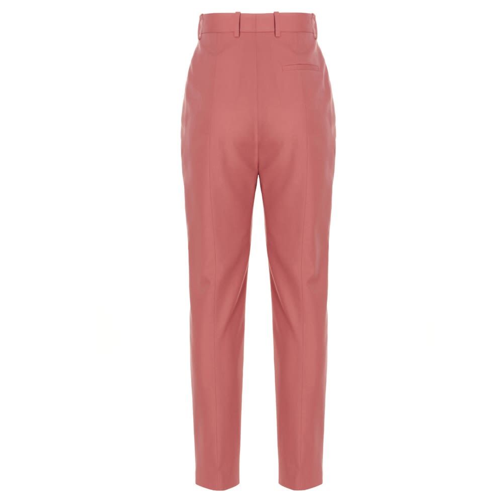 Cigarette-style wool pants with a central pleat, a zip and a hook-and-eye closure.